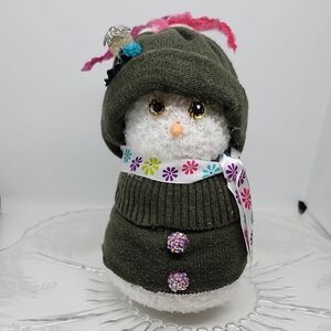 Festive Snowman Holiday Decor with Green Hat and Scarf